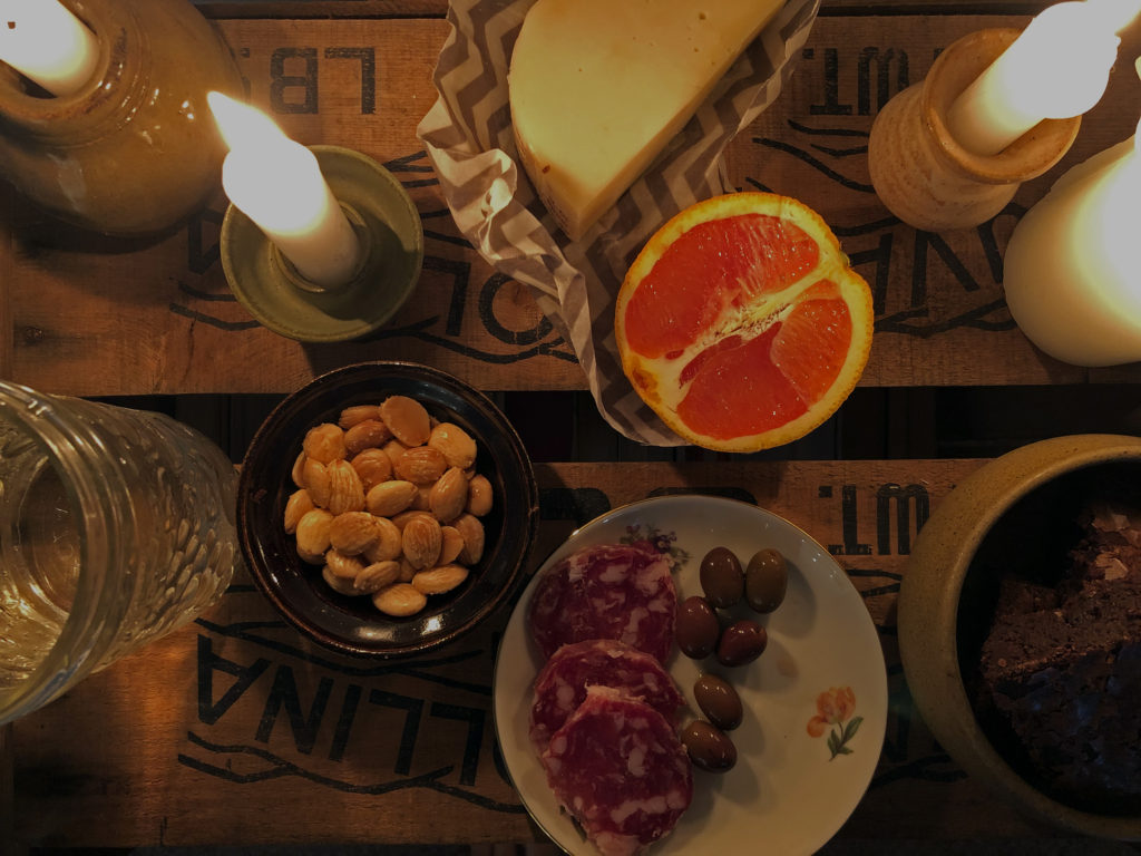 Scene with a candlelit dinner in the dark to celebrate Earth Hour 2020