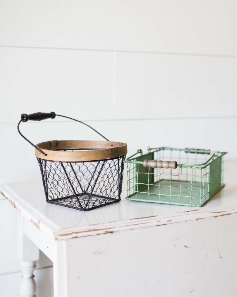 two wire baskets on table