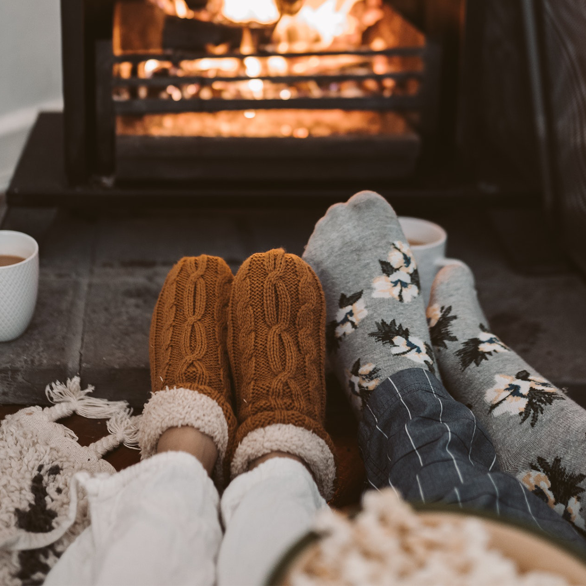 Warming feet at the fireplace