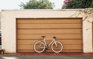 Bicycle in front of a garage door