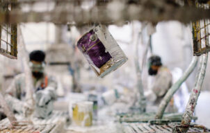 Staff at Product Care’s Delta facility processing leftover paint.