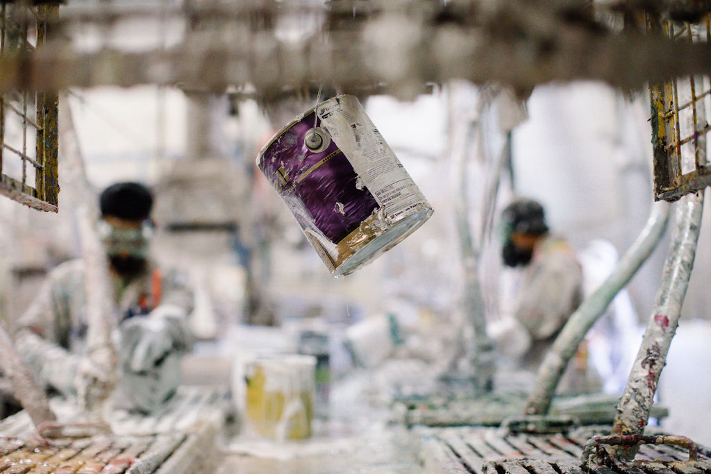 Staff at Product Care’s Delta facility processing leftover paint.