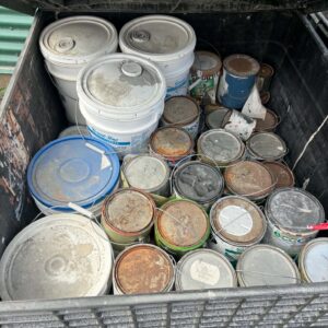 Assorted cans and pails of leftover paint collected for recycling in Hopedale
